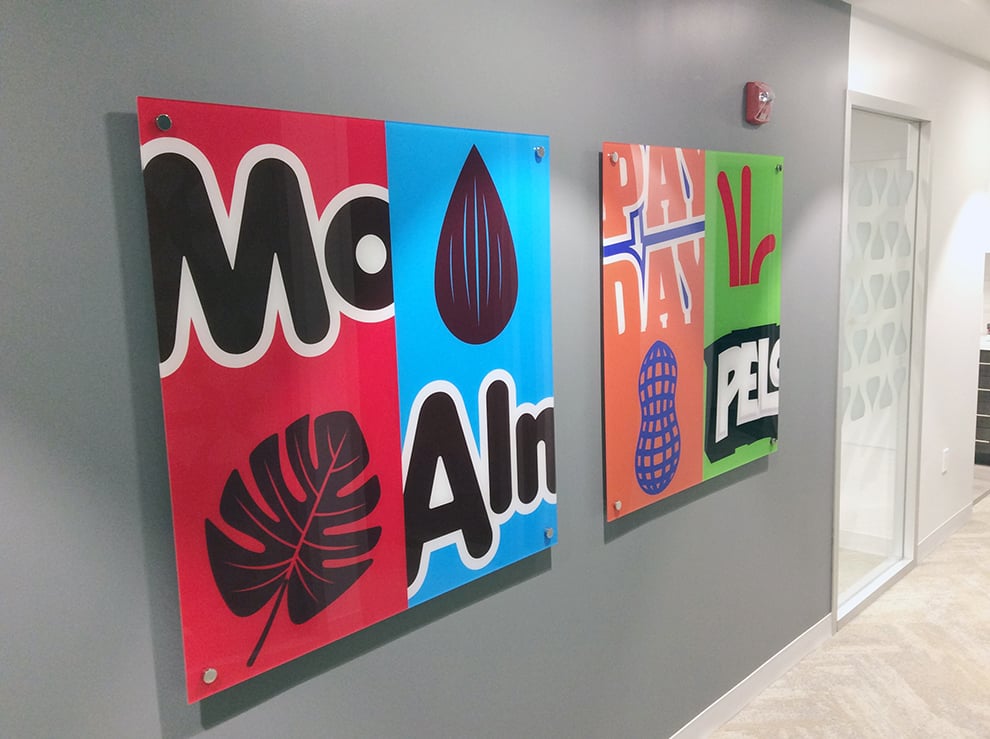 Acrylic Signs in Charlotte, NC designed and installed with clear Plexiglass for interior walls