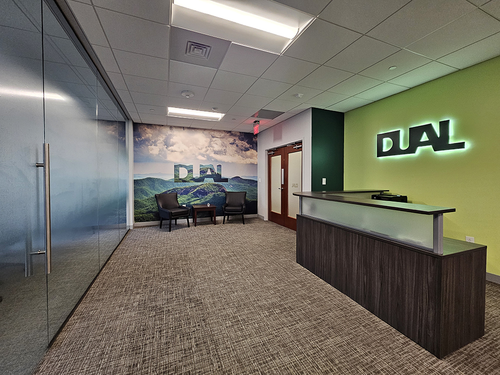 Adhesive vinyl graphics enhancing office branding in Charlotte, NC