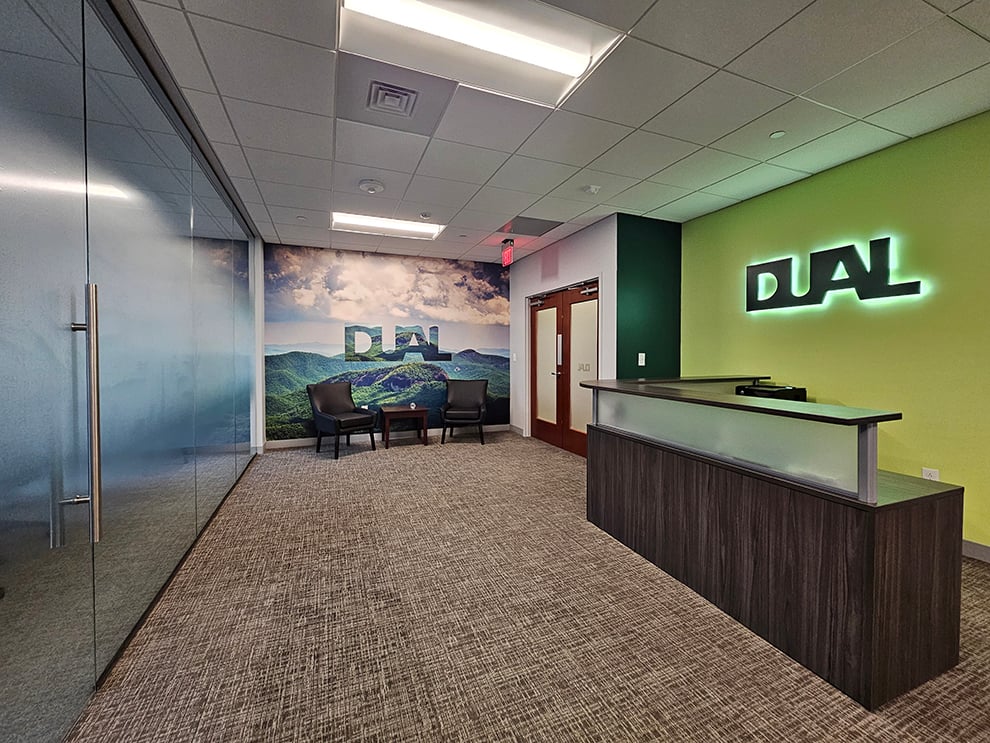 Adhesive vinyl graphics enhancing office branding in Concord, NC