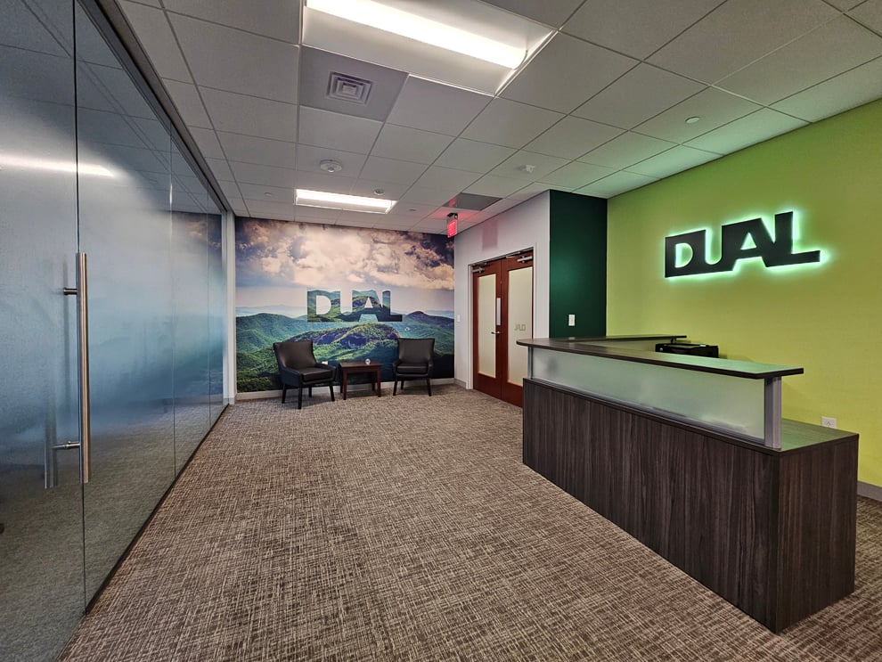 Branded custom signs enhancing workplace interiors in Charlotte, NC