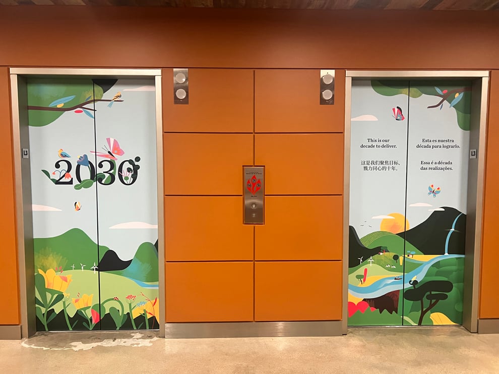Elevator Wraps in Charlotte, NC designed and installed for commercial building interiors and workplace branding
