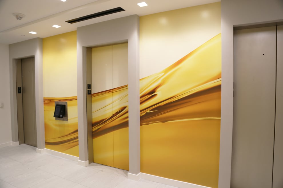 Elevator Wraps in Charlotte, NC designed and installed for office branding and event environments