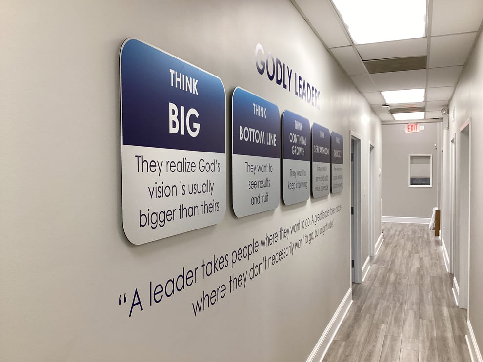 Workplace wall wraps and signage created through environmental graphic design in Charlotte, NC