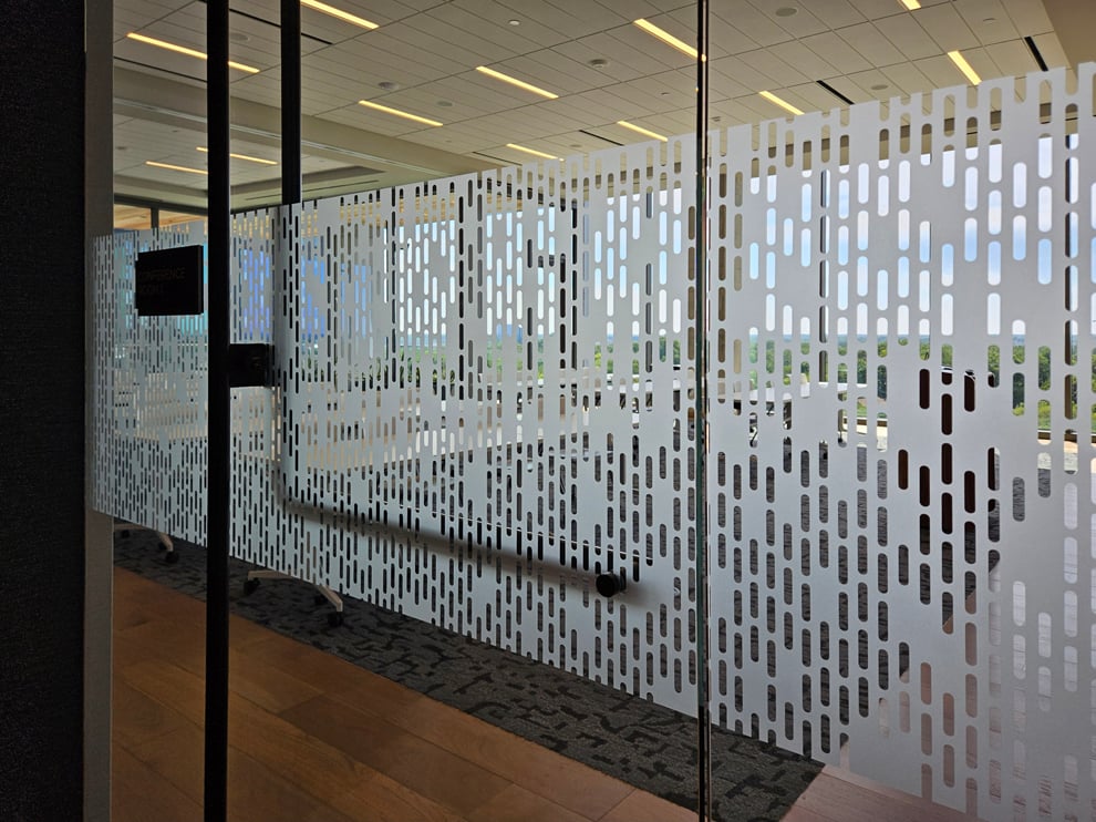 Frosted Vinyl in Charlotte, NC designed and installed for company logos and decorative glass panels