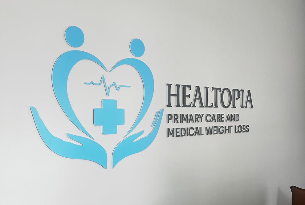 Lobby Signs Salisbury NC designed and installed using custom fabricated dimensional lettering for office entries