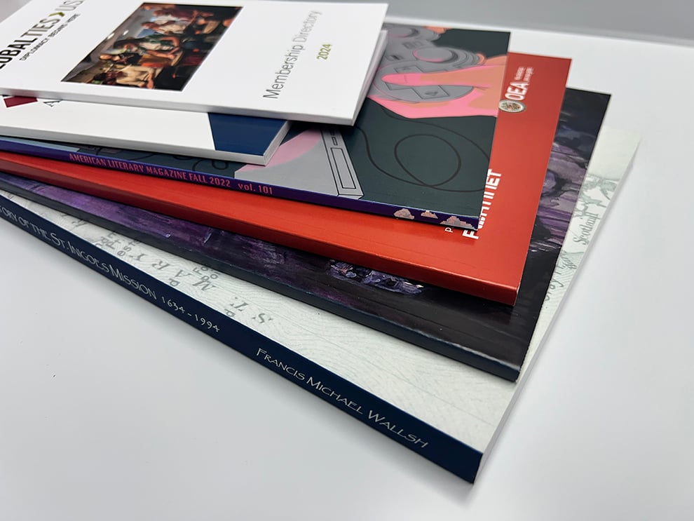 Perfect Bound Books in Charlotte, NC printed and produced for company publications and event programs