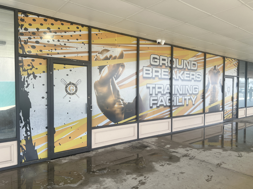 Custom storefront graphics and interior signage for business near Concord, NC