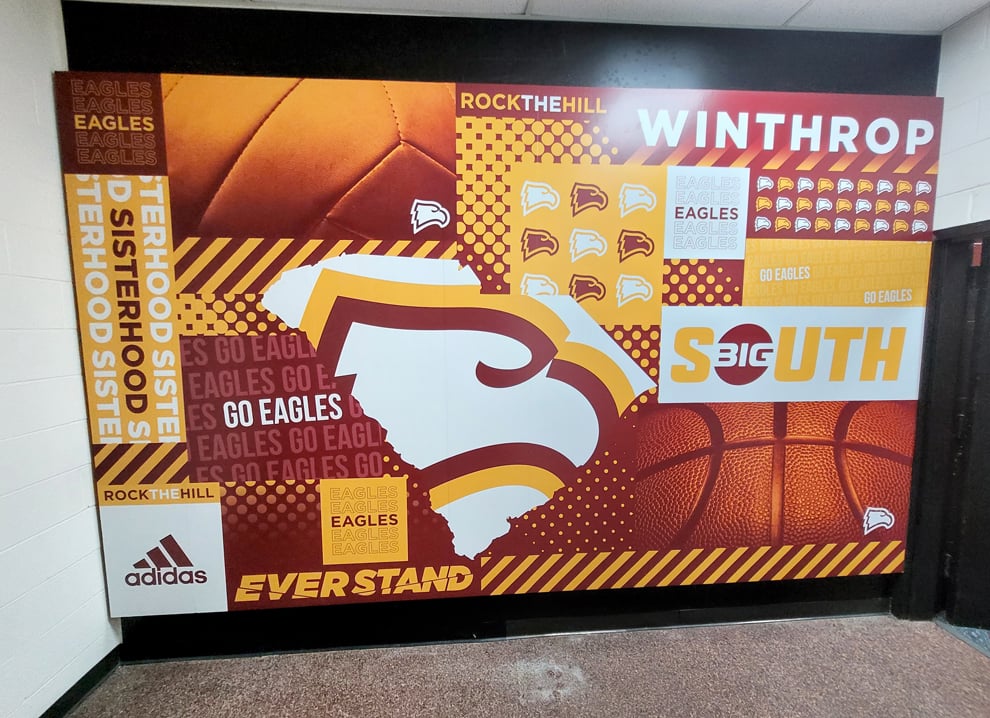 Corporate office wall mural with branding elements in Kannapolis, NC