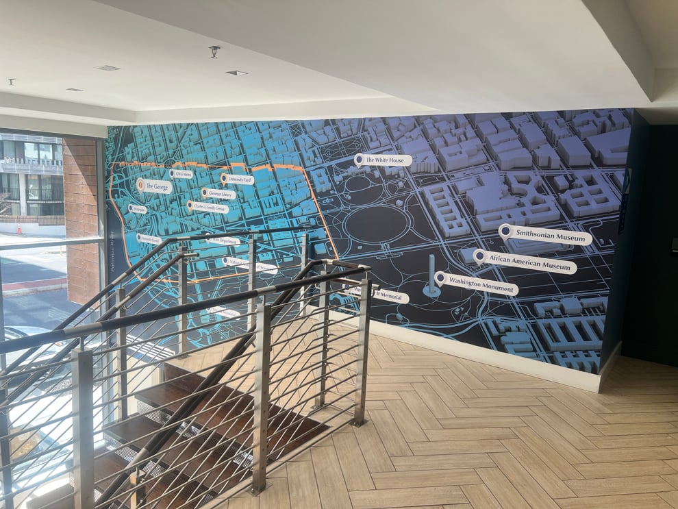 Branded wall wrap mural reinforcing company culture in Rock Hill, SC office