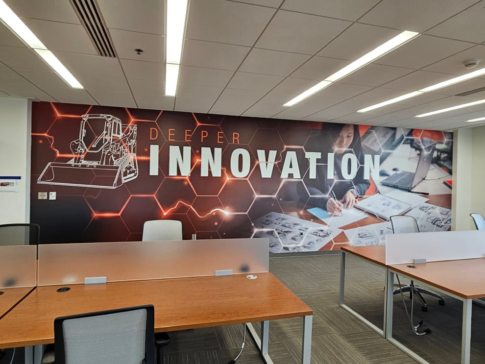 Custom wall wrap graphics enhancing corporate interiors in Statesville, NC