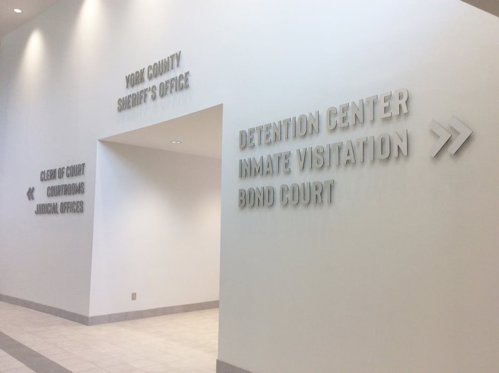 Branded wayfinding signs installed for office environments in Charlotte, NC