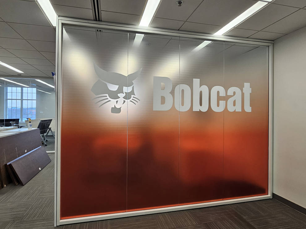 Window Graphics in Concord, NC designed and installed with frosted vinyl for workplace interiors