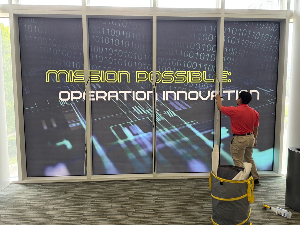 Professional office sign installation with custom graphics in Charlotte NC